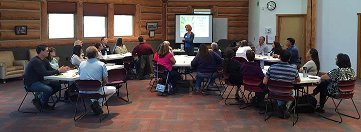 Karen McNenny of Made You Think Consulting hosts a team building event with the employees of S&K Technologies, Inc. in Montana.